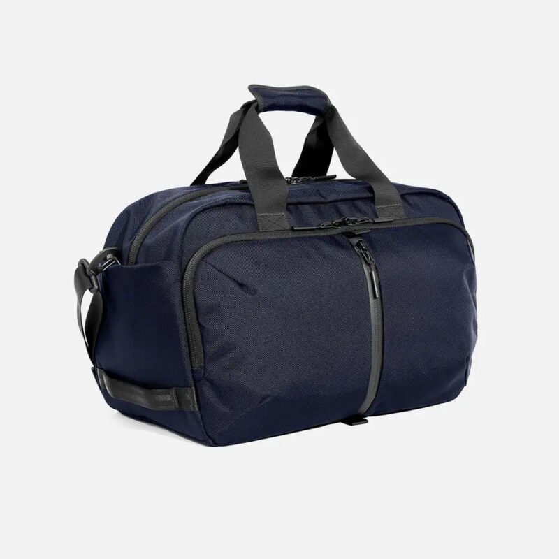 AER23048_travelweekender_navy_34hero_1.jpg AER23048_travelweekender_navy_34hero_1.jpg